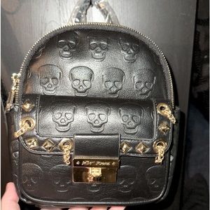 New Betsey Johnson no brained mini skull backpack